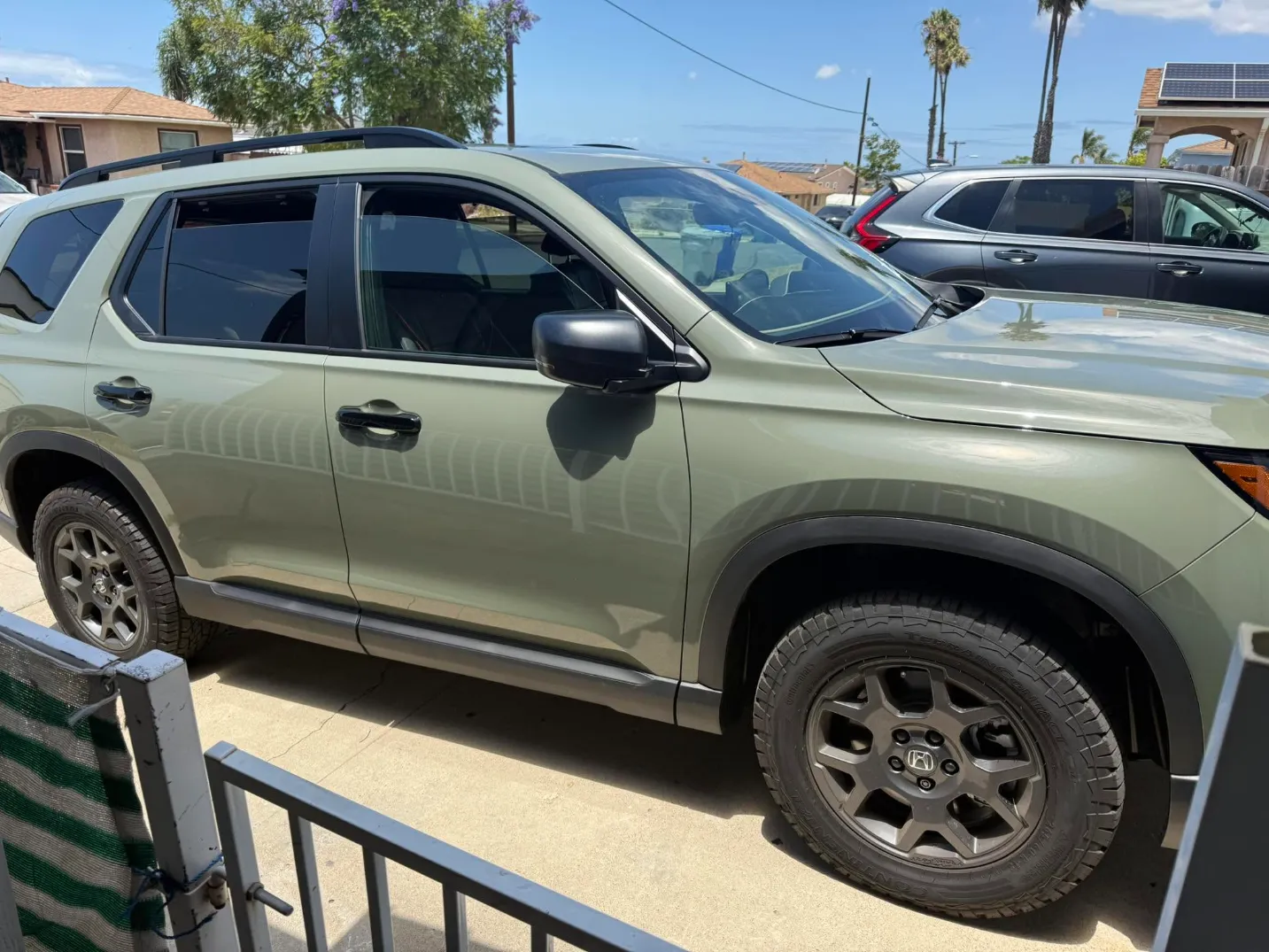 2026 Honda Pilot TrailSport Shown in Ash Green Metallic Color in Under Direct Sunlight