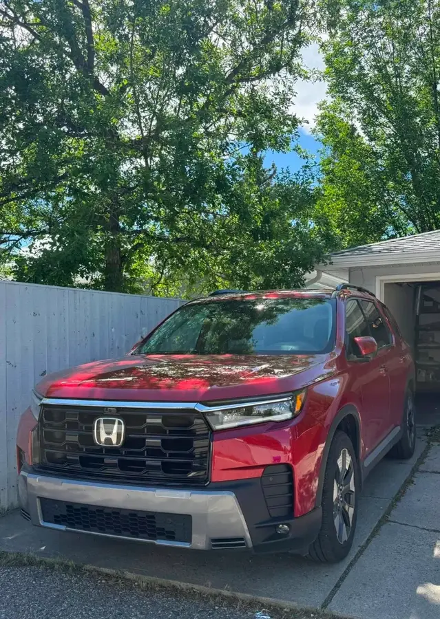Honda Pilot Elite Shown in Radiant Red Metallic II Color