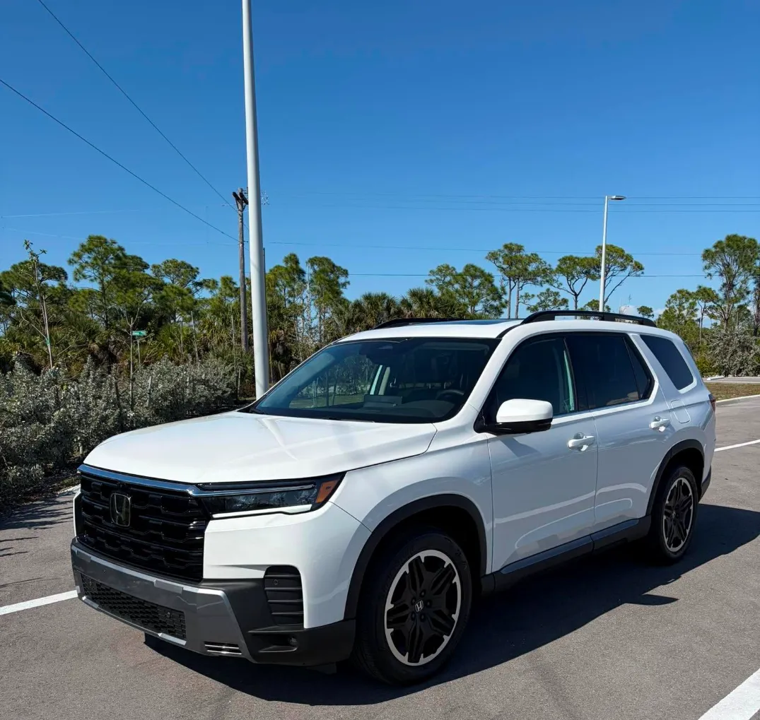 Honda Pilot Elite Shown on Platinum White Pearl