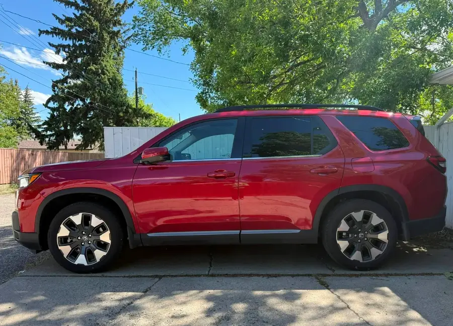Honda Pilot With Radiant Red Metallic II Color On The Shadow