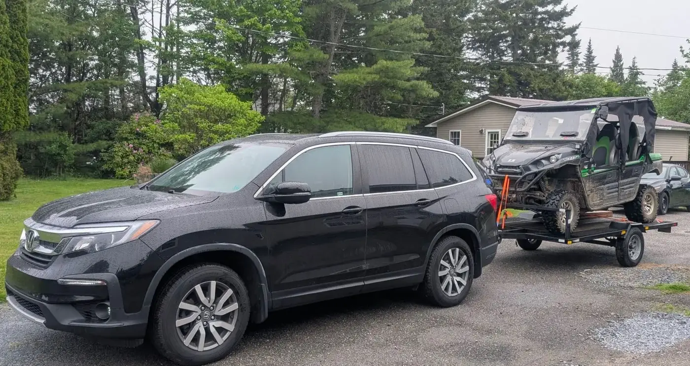 Honda Pilot Towing a dirt 4-wheeler